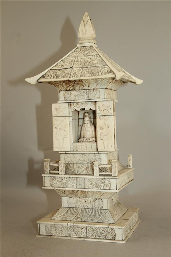 A Japanese ivory veneered model of a shrine, early 20th century, 32.5cm, wood stand